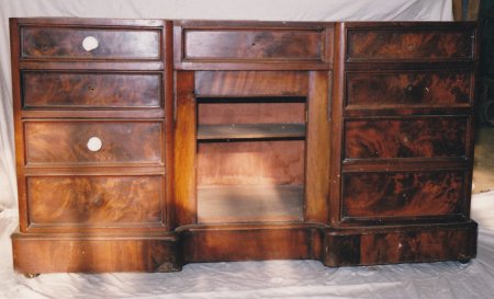 Mahogany washstand with missing knobs, door and broken veneer