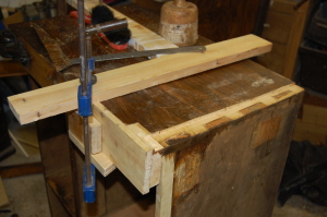 Walnut Chiffonier being repaired